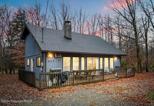 a view of house with a outdoor space