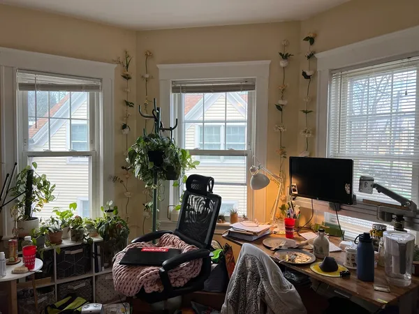 a room with furniture and a flat screen tv
