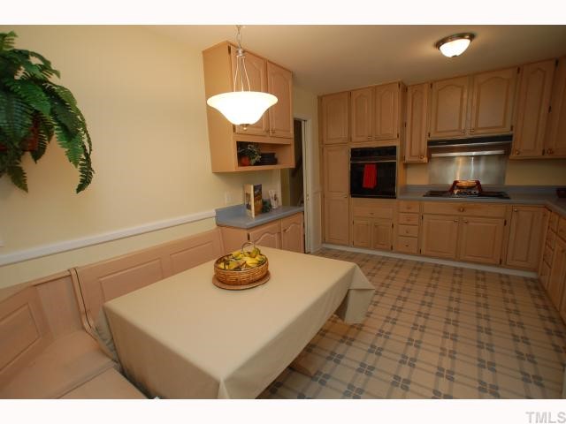 731 Davidson Street Raleigh, NC 27609 - Photo 3 of 10 The kitchen offers wonderful space and loads of cabinet storage. The table and benches convey, but they are movable.