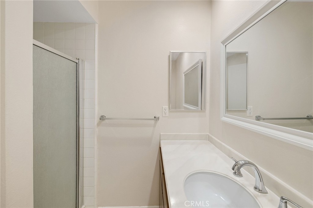28003 Ridgebrook Court Rancho Palos Verdes, CA 90275 - Photo 14 of 25 a bathroom with a sink and a toilet