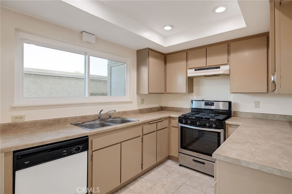 28003 Ridgebrook Court Rancho Palos Verdes, CA 90275 - Photo 8 of 25 a kitchen with a sink stove top oven and cabinets
