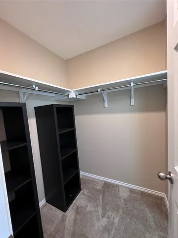 a view of a backyard with sitting area