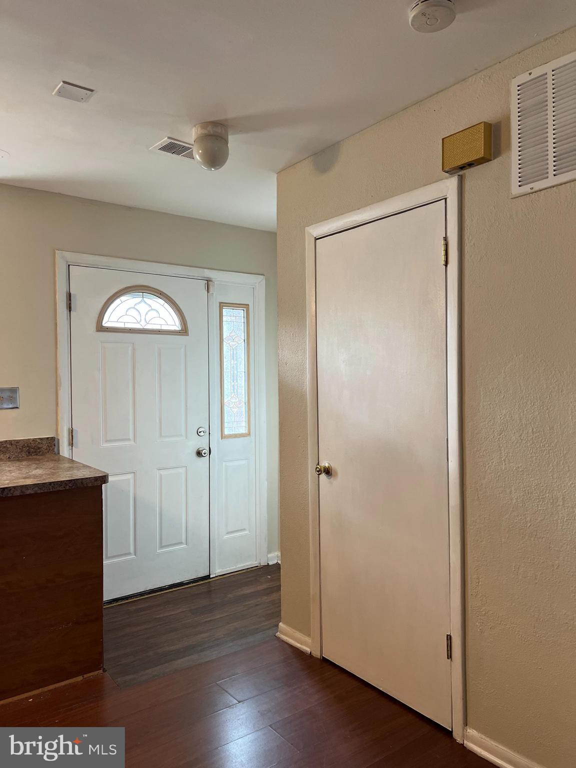 9580 Canterbury Riding, Unit 210 Laurel, MD 20723 - Photo 5 of 10 a view of a hallway with wooden floor