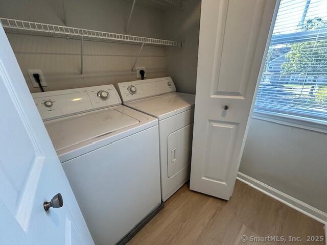 138 Hollow Tree Ridge Road, Unit 121 Darien, CT 06820 - Photo 16 of 26 a utility room with dryer and washer