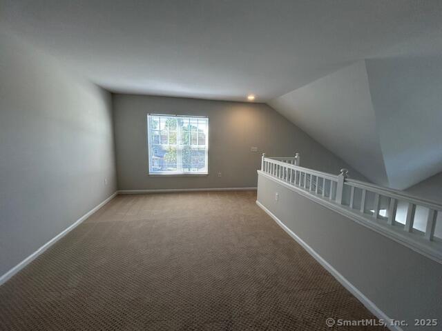 138 Hollow Tree Ridge Road, Unit 121 Darien, CT 06820 - Photo 24 of 26 a view of an empty room with a window