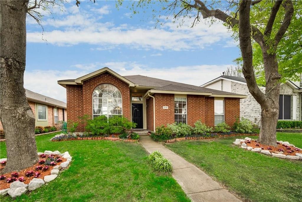 2114 Carnation Court Garland, TX 75040 - Photo 1 of 6 a front view of a house with a yard
