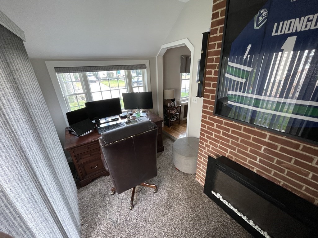 22 Westbrook Road Worcester, MA 01602 - Photo 14 of 39 a living room with furniture and a window