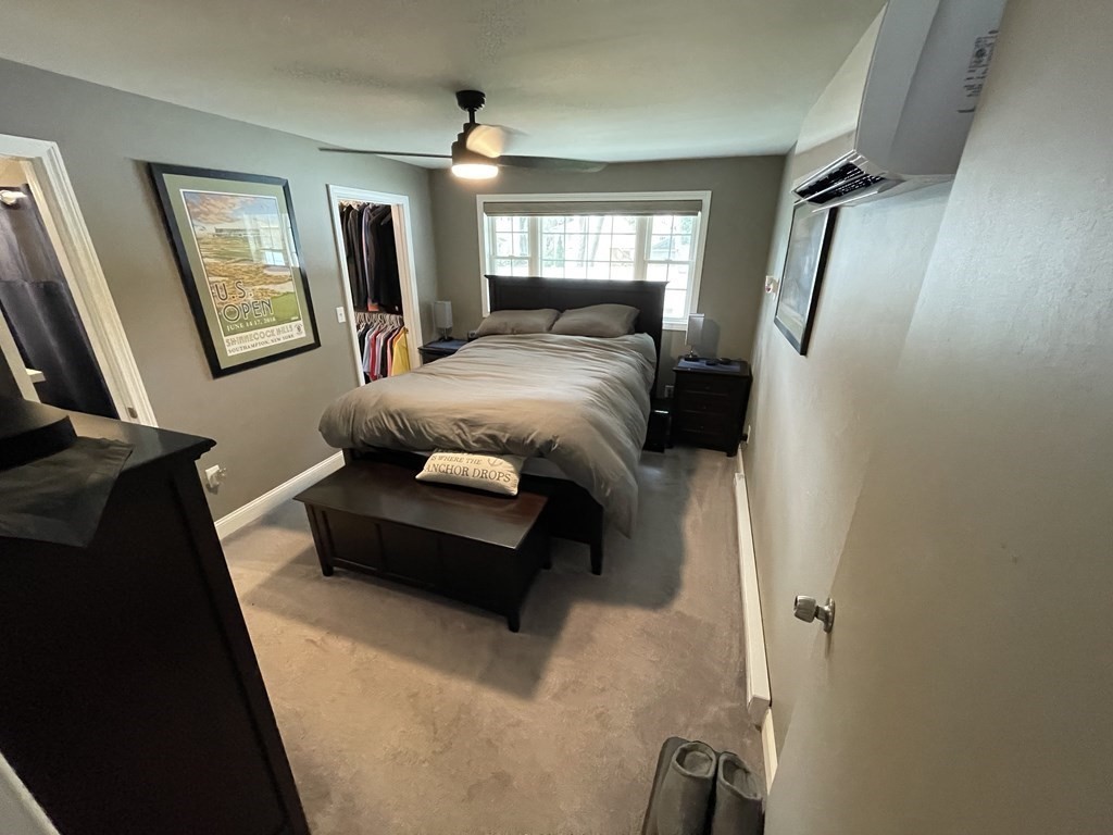 22 Westbrook Road Worcester, MA 01602 - Photo 22 of 39 a bed room with a bed window and mirror