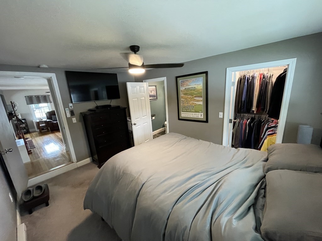 22 Westbrook Road Worcester, MA 01602 - Photo 23 of 39 a bedroom with a bed and a television