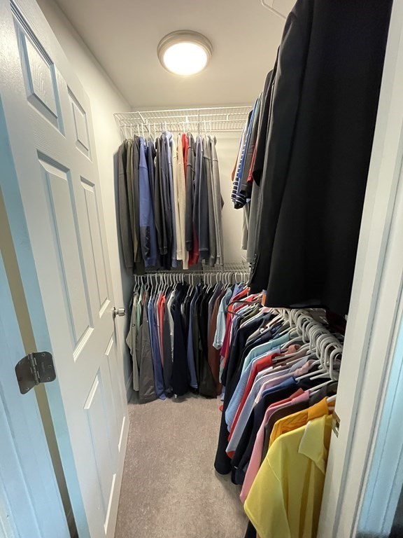 22 Westbrook Road Worcester, MA 01602 - Photo 25 of 39 a view of walk in closet with clothes