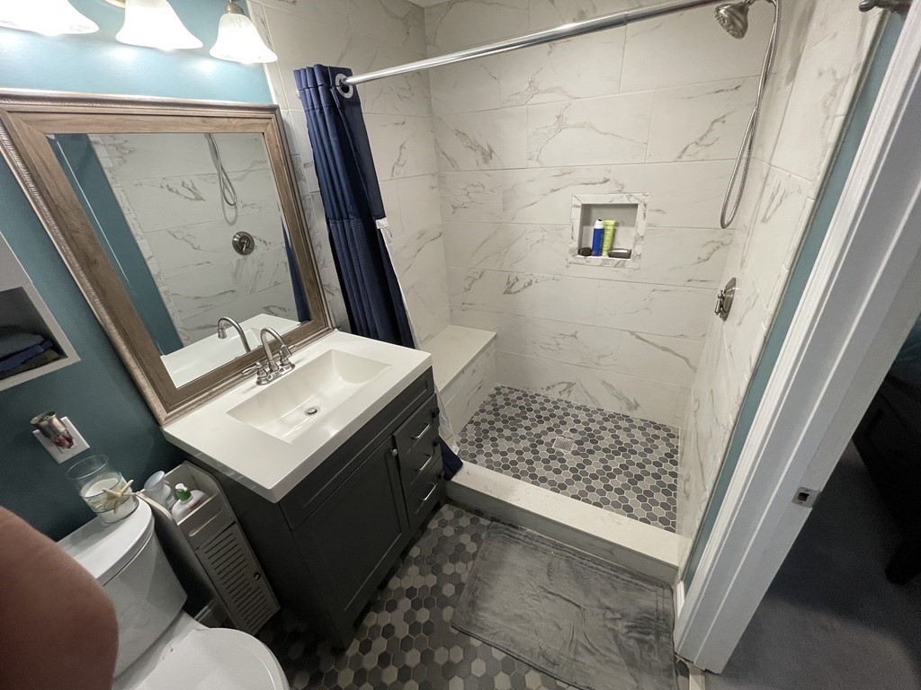 22 Westbrook Road Worcester, MA 01602 - Photo 26 of 39 a bathroom with a sink toilet and shower