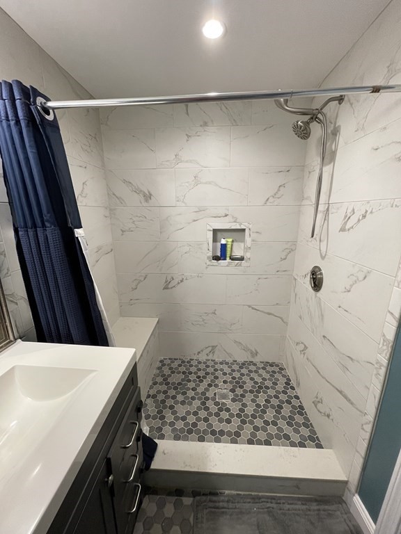 22 Westbrook Road Worcester, MA 01602 - Photo 28 of 39 a bathroom with a shower and a sink