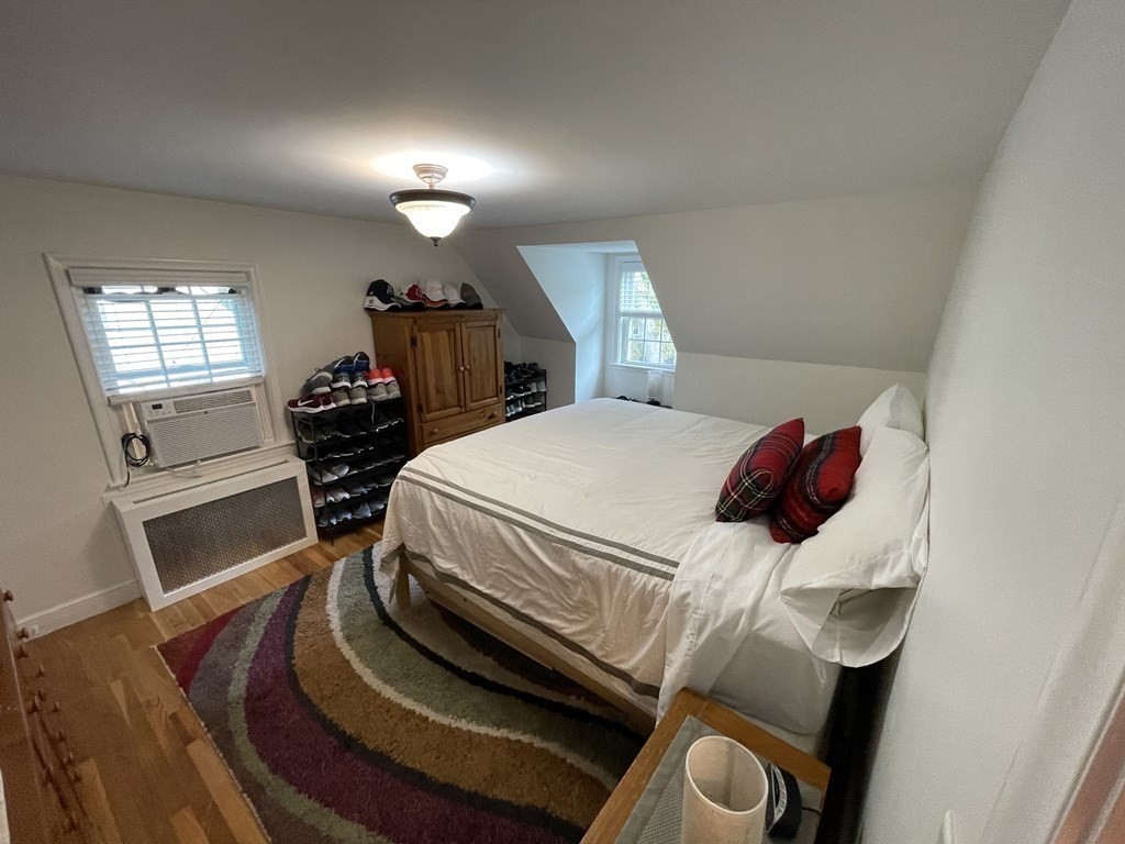 22 Westbrook Road Worcester, MA 01602 - Photo 31 of 39 a bedroom with a bed and window