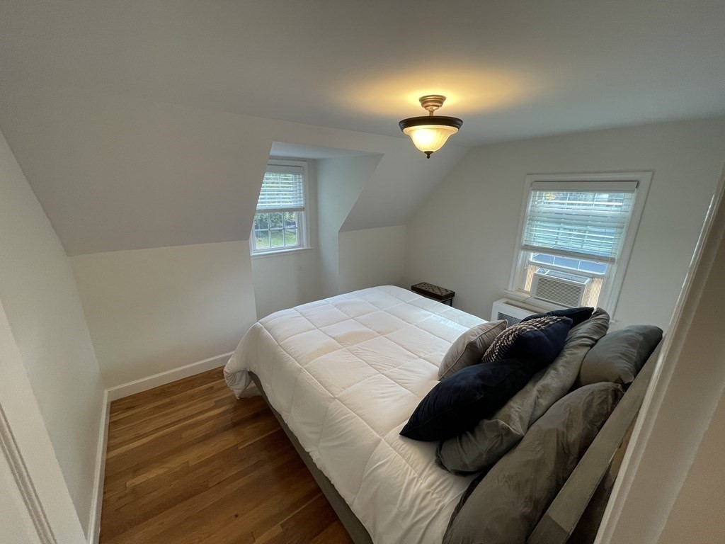 22 Westbrook Road Worcester, MA 01602 - Photo 33 of 39 a bedroom with a bed and a window