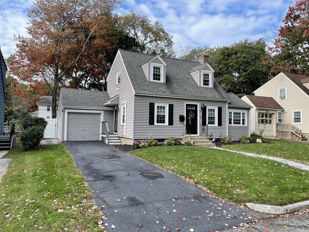 22 Westbrook Road Worcester, MA 01602 - Photo 4 of 39 a front view of a house with a garden and yard
