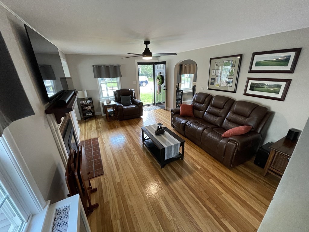 22 Westbrook Road Worcester, MA 01602 - Photo 10 of 39 a living room with furniture and a fireplace