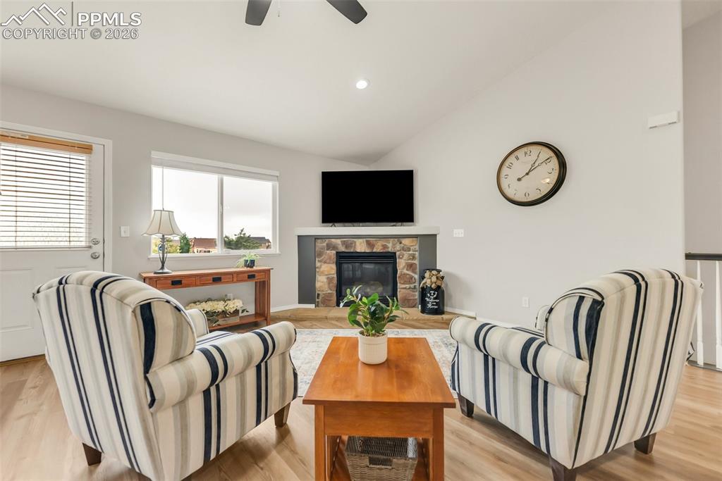 10467 Pictured Rocks Drive Peyton, CO 80831 - Photo 15 of 42 Living Room space with a gas fireplace