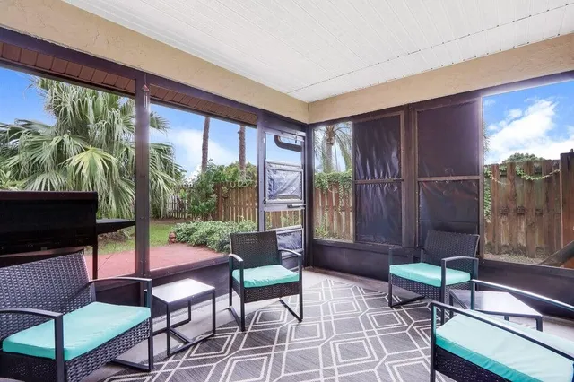 a view of swimming pool with a patio