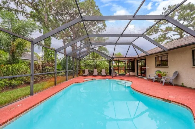 a view of a backyard with a garden