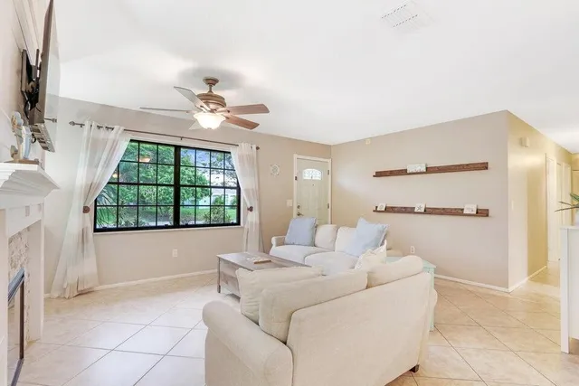 a living room with furniture and a window