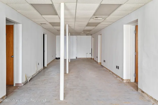a view of livingroom with hardwood floor and hallway