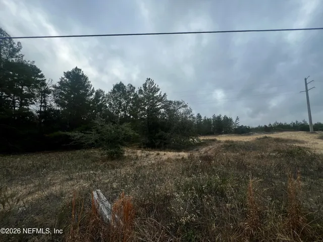 a view of a lake with beach