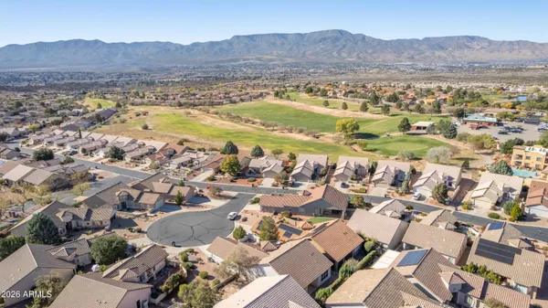 an aerial view of residential house and lake view