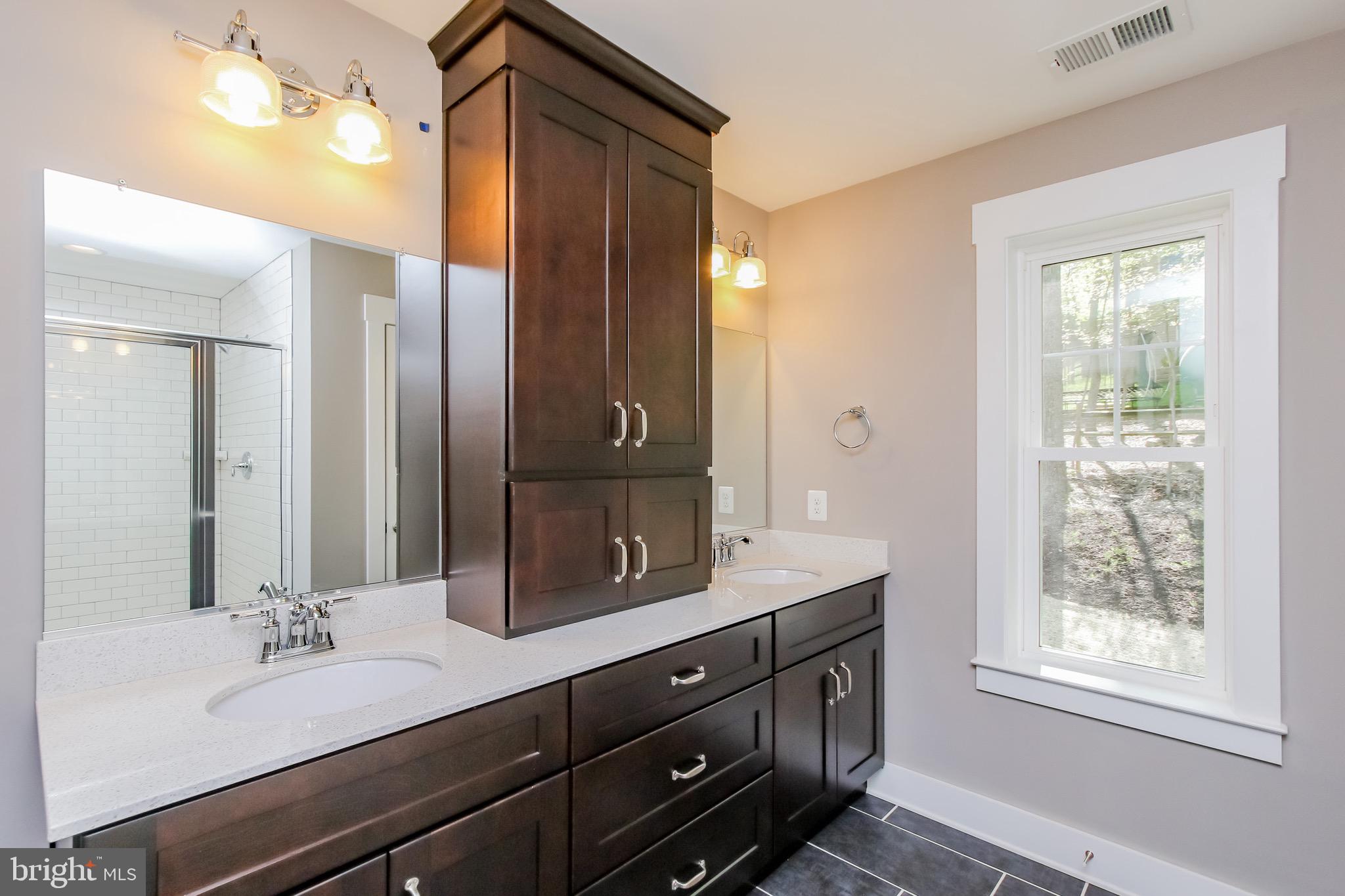 6346 Zittlestown Road Boonsboro, MD 21713 - Photo 15 of 27 a bathroom with a granite countertop sink and a mirror