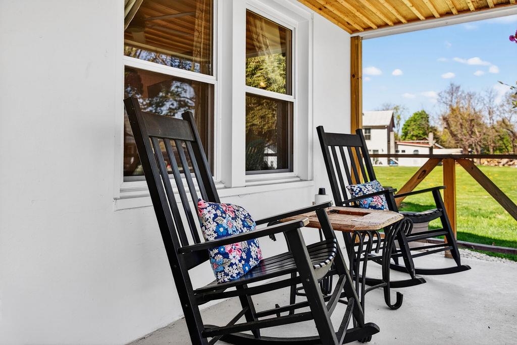 18 Bartley Street Staunton, VA 24401 - Photo 14 of 52 a view of an chairs and table in the balcony