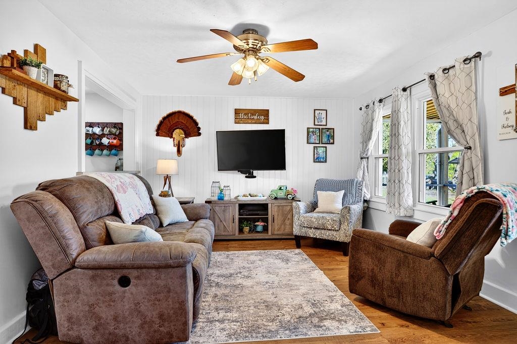18 Bartley Street Staunton, VA 24401 - Photo 19 of 52 a living room with furniture a flat screen tv and a fireplace