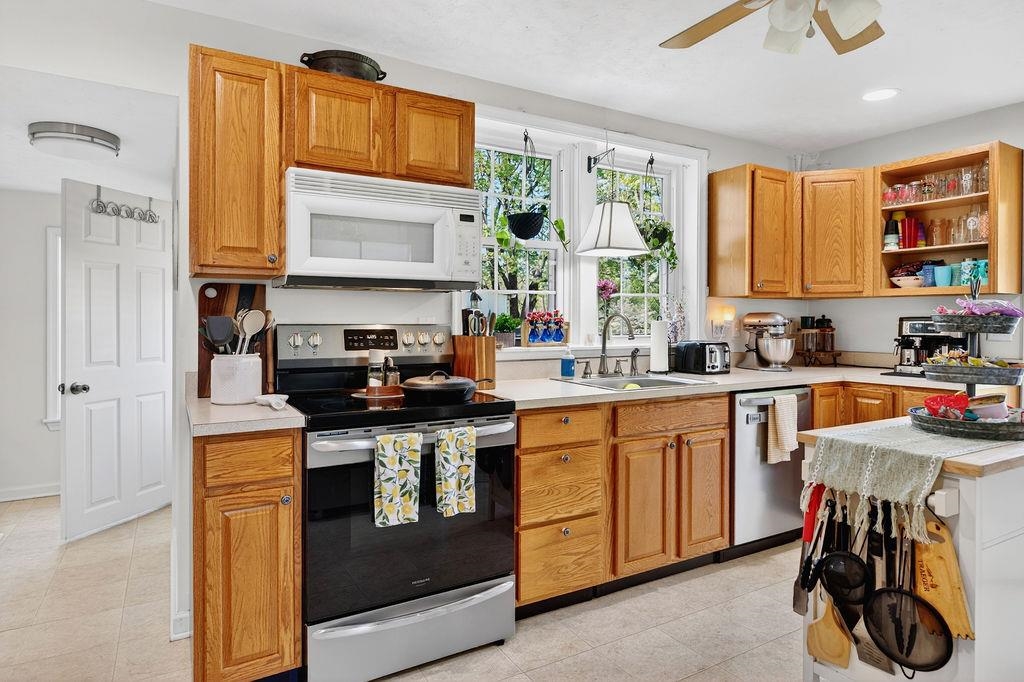 18 Bartley Street Staunton, VA 24401 - Photo 22 of 52 a kitchen with stainless steel appliances granite countertop a stove and a sink