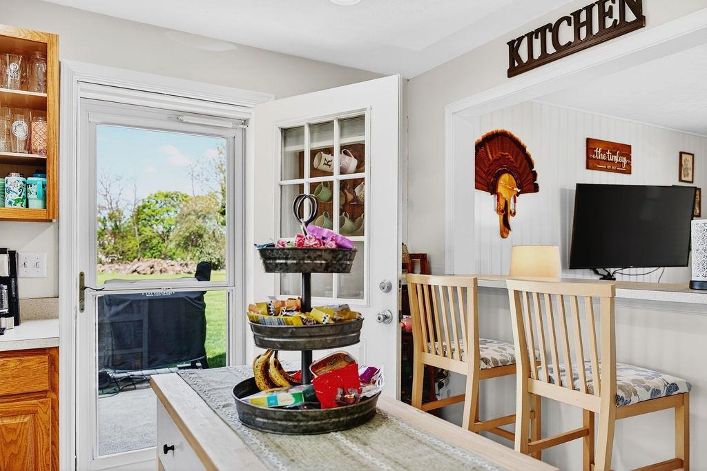 18 Bartley Street Staunton, VA 24401 - Photo 23 of 52 a living room with furniture a flat screen tv and a table