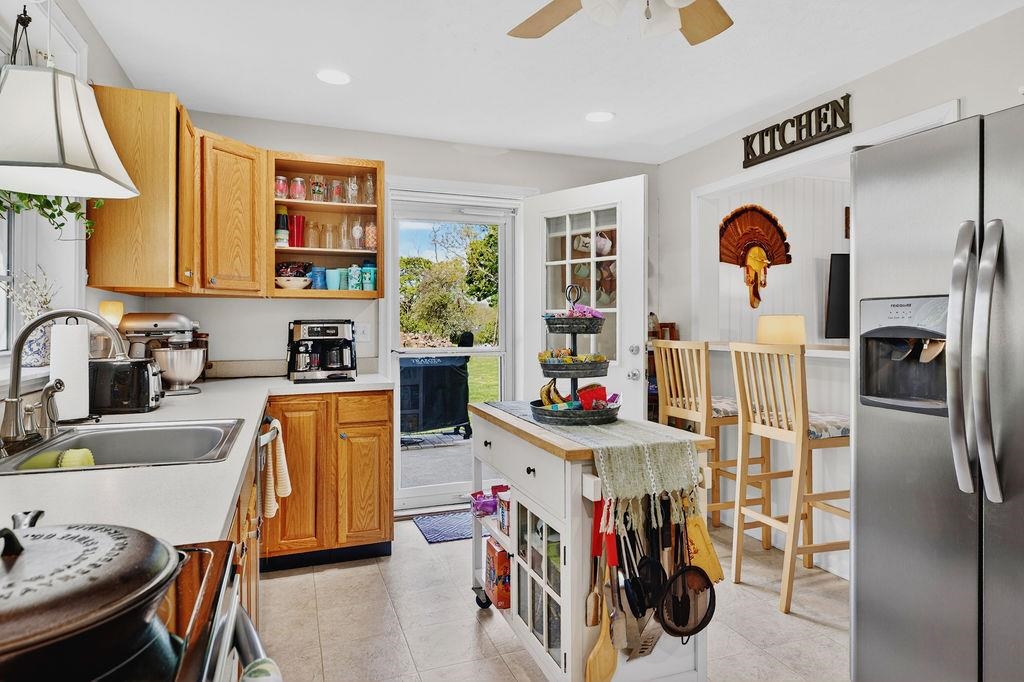 18 Bartley Street Staunton, VA 24401 - Photo 24 of 52 a view of a kitchen with appliances and a chandelier