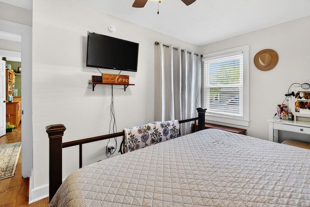 18 Bartley Street Staunton, VA 24401 - Photo 31 of 52 a bedroom with a bed and flat screen tv