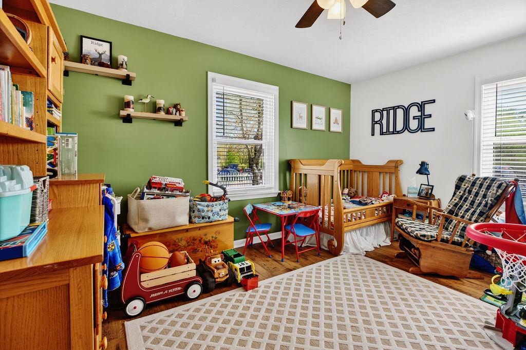 18 Bartley Street Staunton, VA 24401 - Photo 32 of 52 a bedroom with furniture and a potted plant
