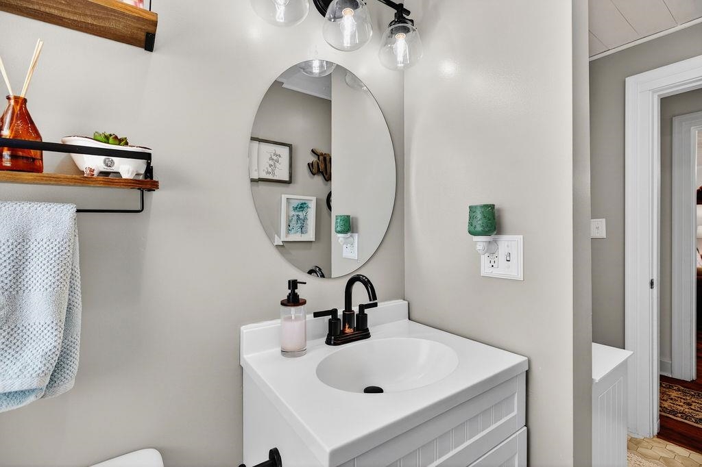 18 Bartley Street Staunton, VA 24401 - Photo 36 of 52 a bathroom with a sink and a mirror