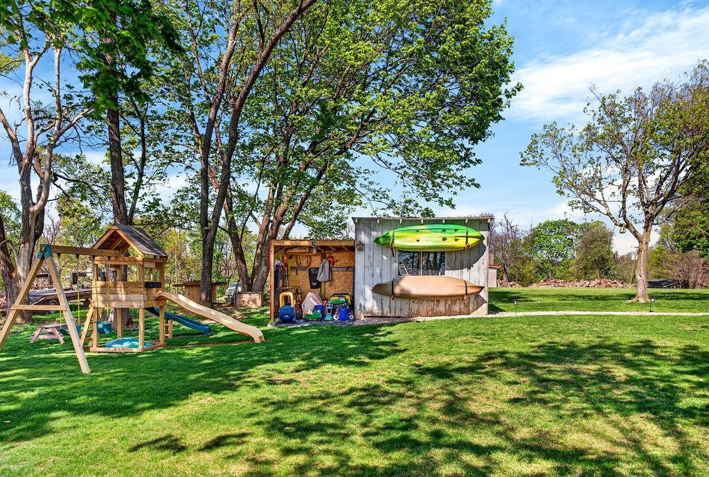 18 Bartley Street Staunton, VA 24401 - Photo 40 of 52 a front view of a house with a yard table and chairs
