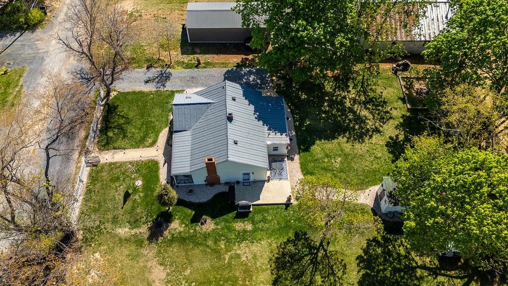 18 Bartley Street Staunton, VA 24401 - Photo 41 of 52 a backyard of a house with yard and outdoor seating