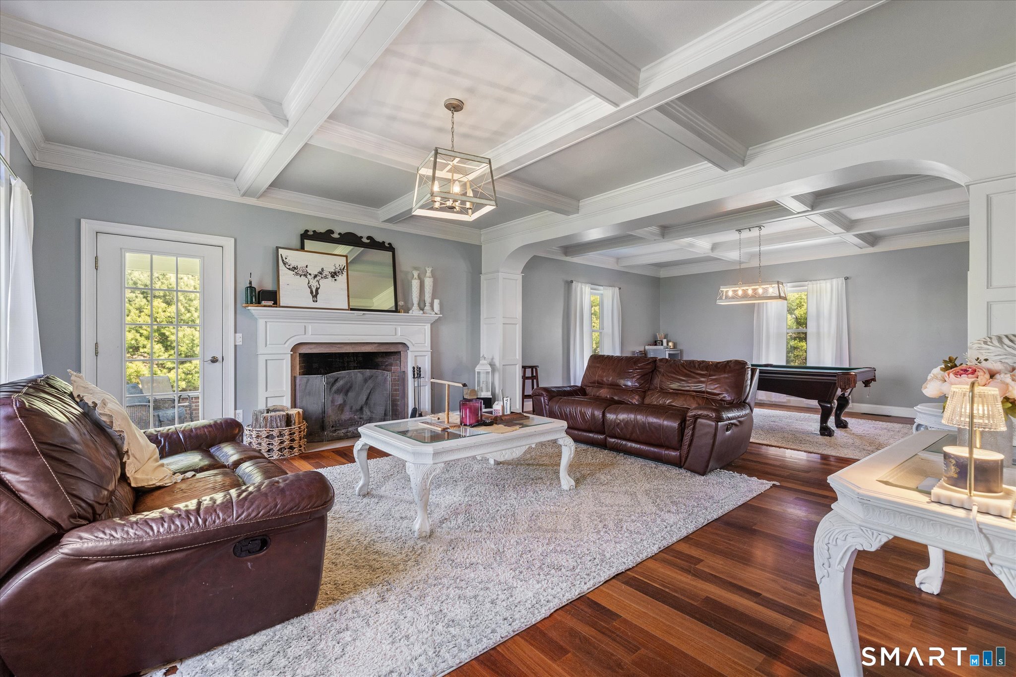 316 Allen Hill Road Brooklyn, CT 06234 - Photo 15 of 40 a living room with furniture and a fireplace