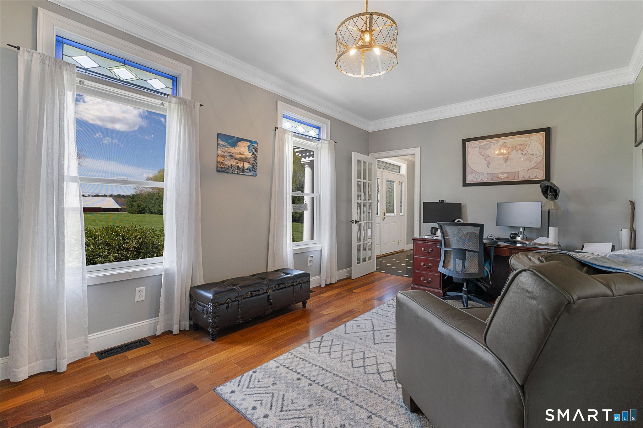 316 Allen Hill Road Brooklyn, CT 06234 - Photo 17 of 40 a living room with furniture and a window