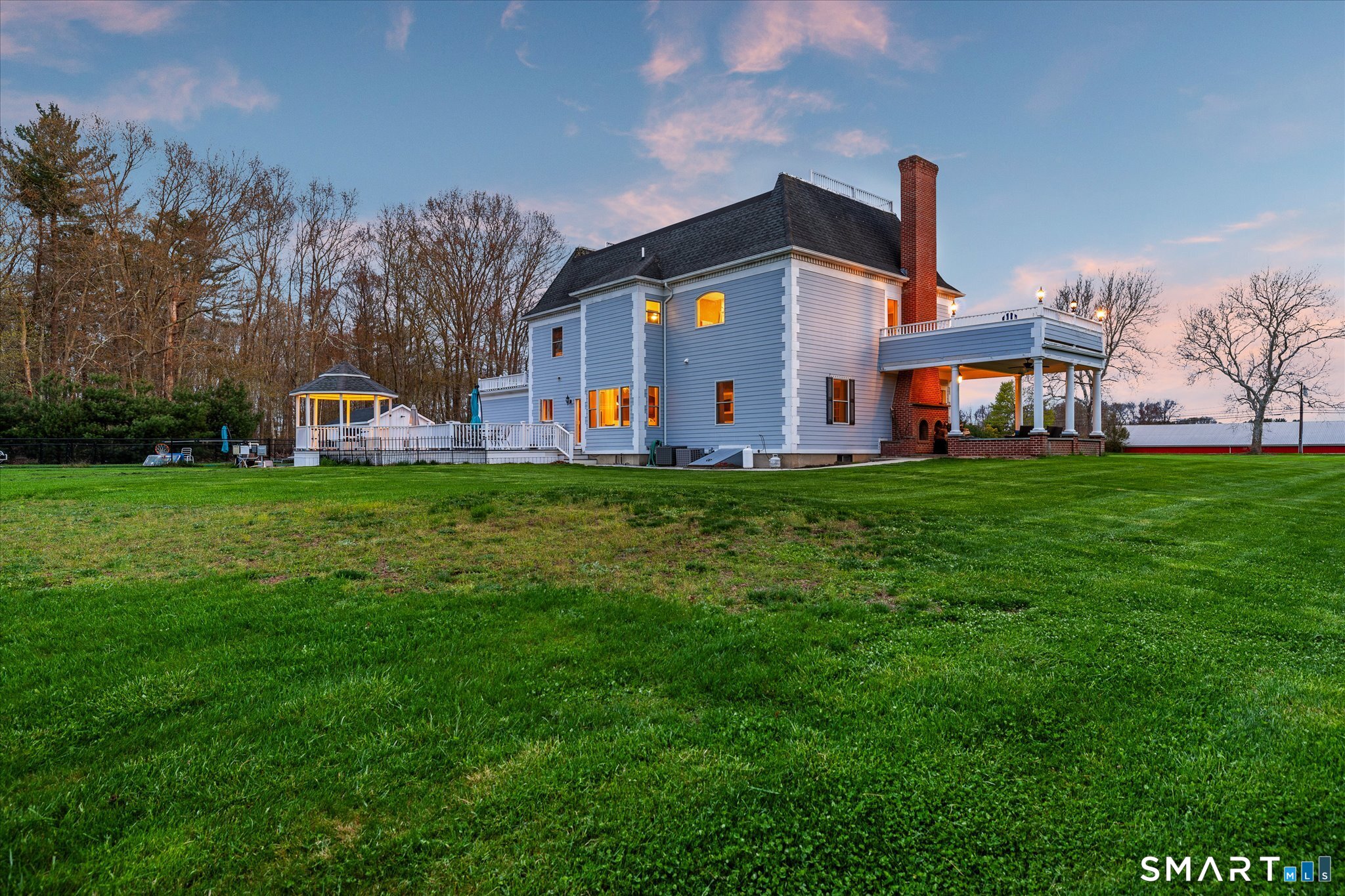 316 Allen Hill Road Brooklyn, CT 06234 - Photo 2 of 40 a front view of a house with a yard and garage