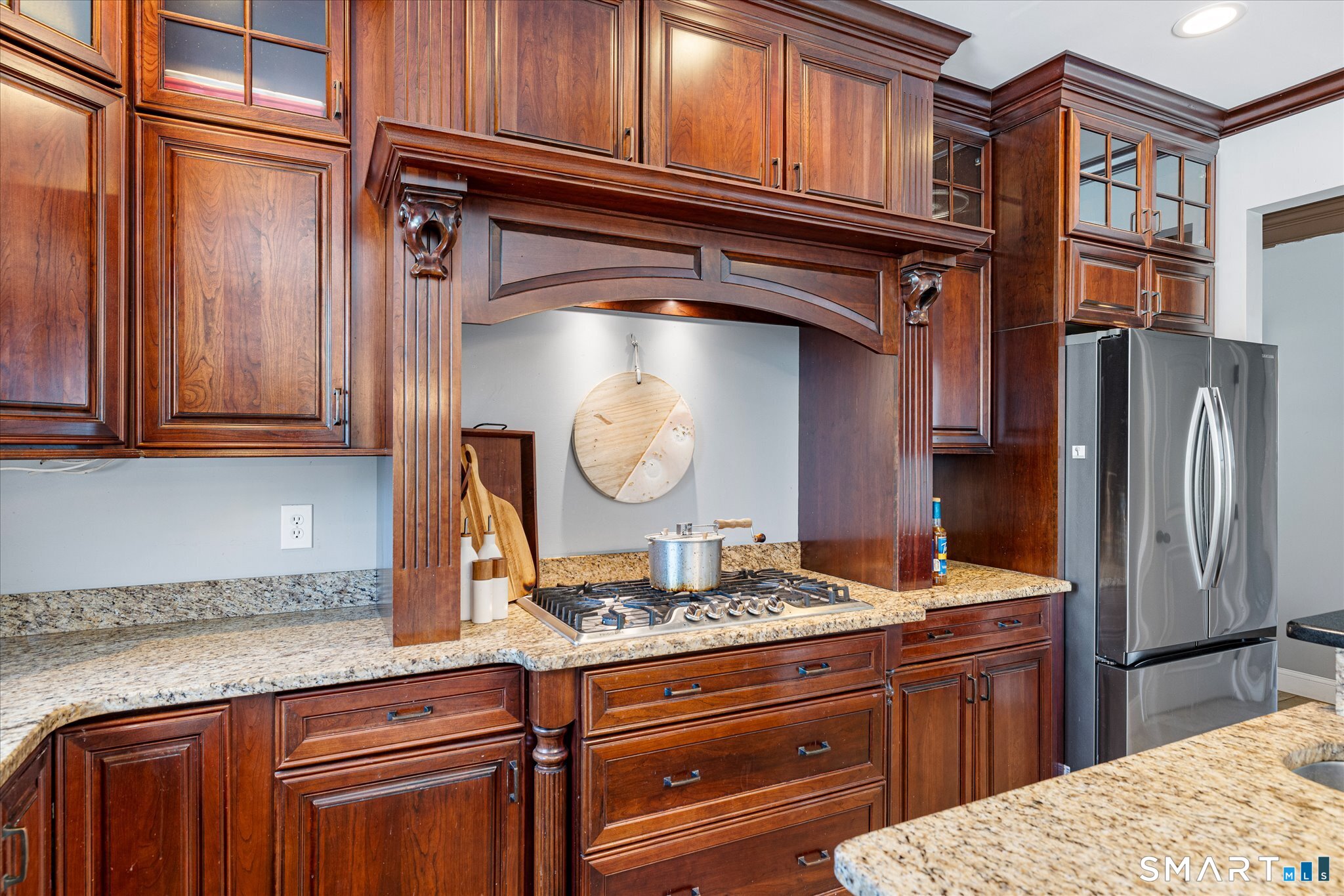 316 Allen Hill Road Brooklyn, CT 06234 - Photo 23 of 40 a kitchen with stainless steel appliances granite countertop a stove a washer and dryer