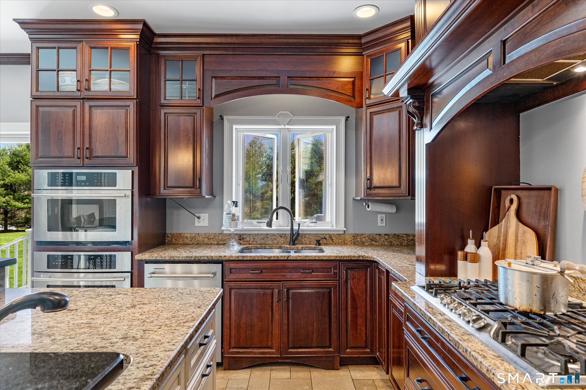 316 Allen Hill Road Brooklyn, CT 06234 - Photo 24 of 40 a kitchen with stainless steel appliances granite countertop a stove and a sink