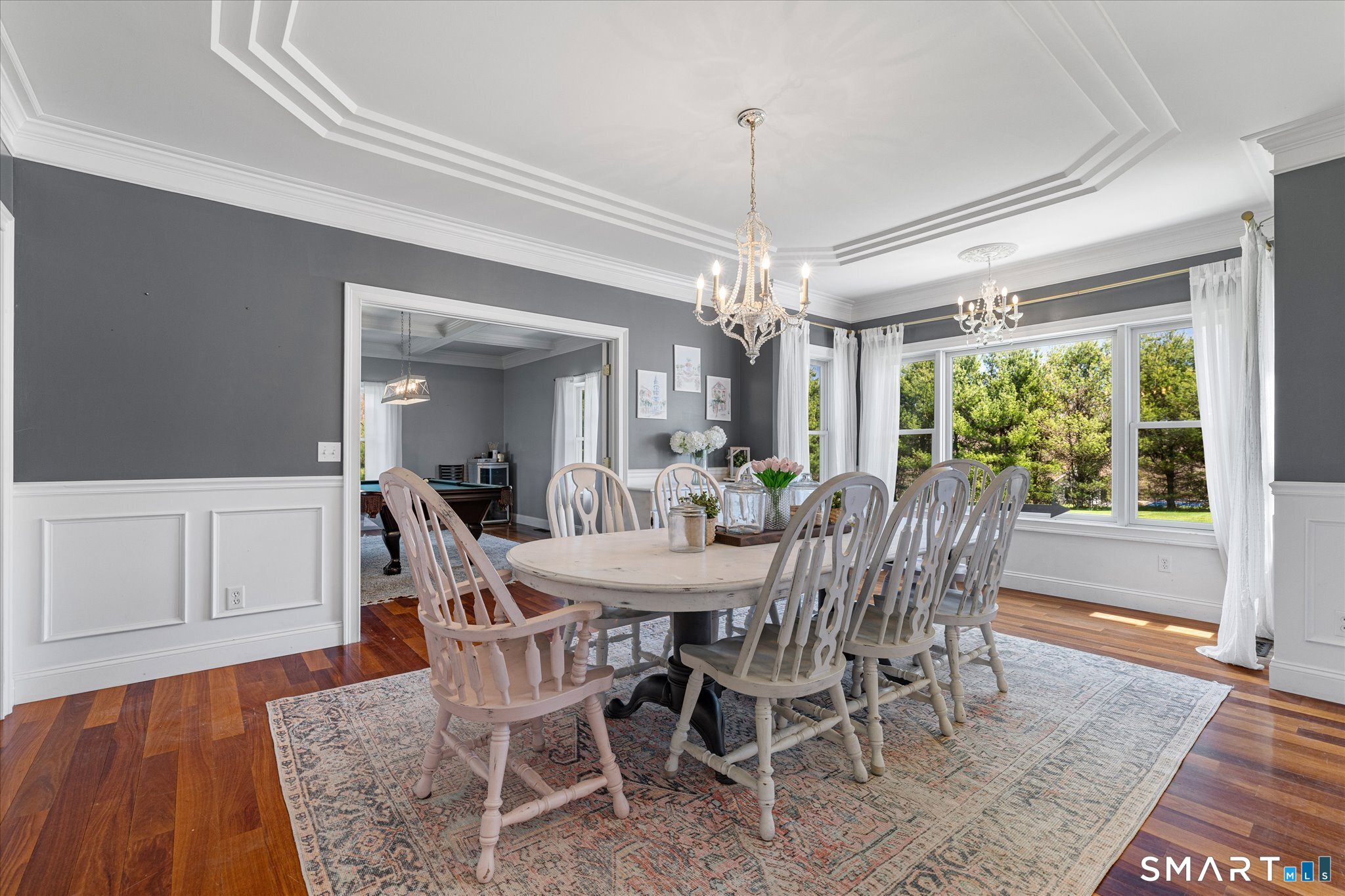 316 Allen Hill Road Brooklyn, CT 06234 - Photo 27 of 40 a view of a dining room with furniture window and wooden floor