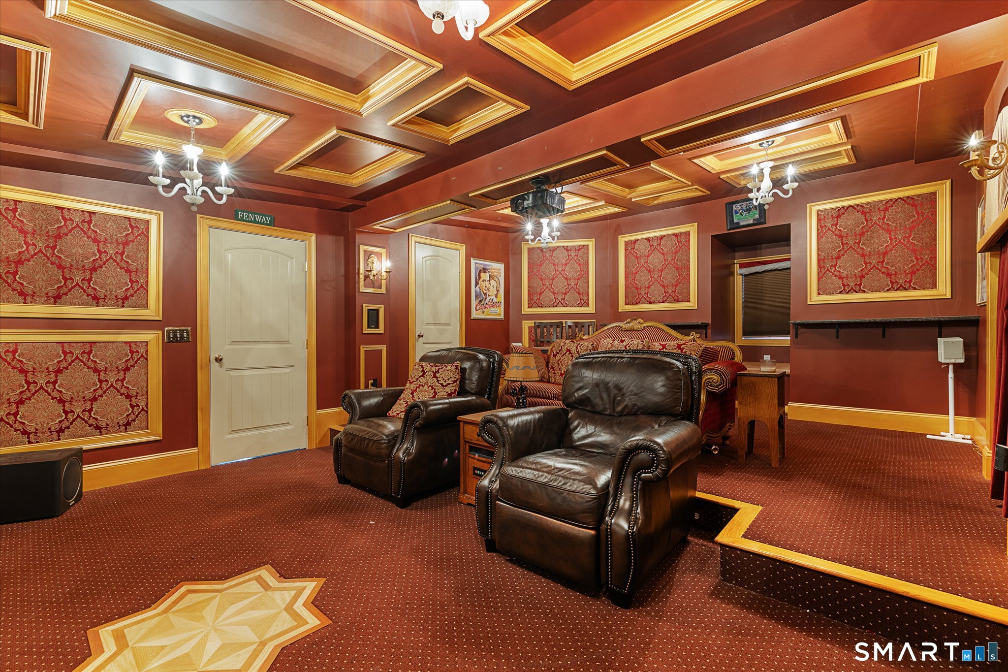 316 Allen Hill Road Brooklyn, CT 06234 - Photo 37 of 40 a media room with lots of chairs and a projector screen