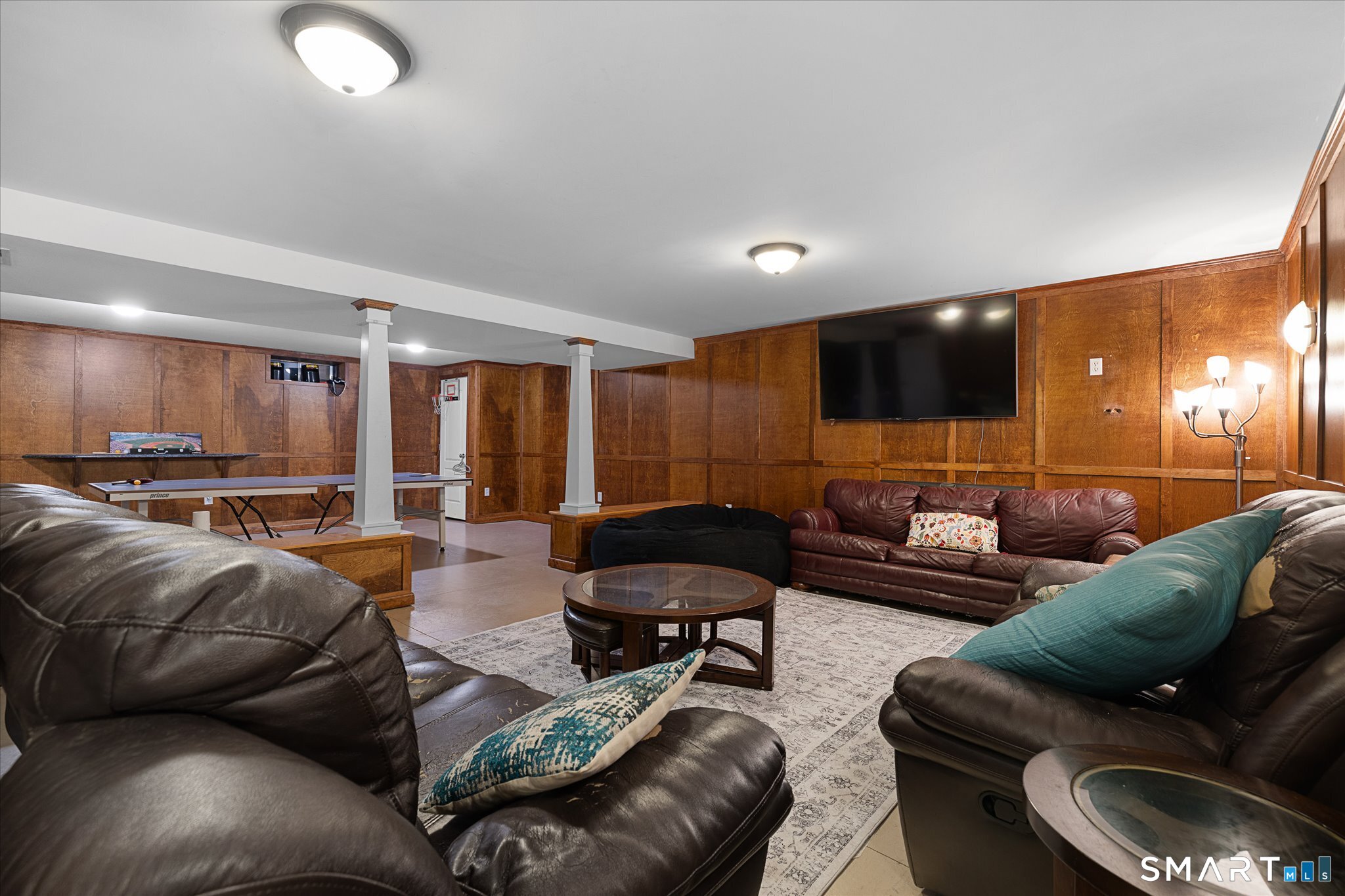 316 Allen Hill Road Brooklyn, CT 06234 - Photo 39 of 40 a living room with furniture and a flat screen tv