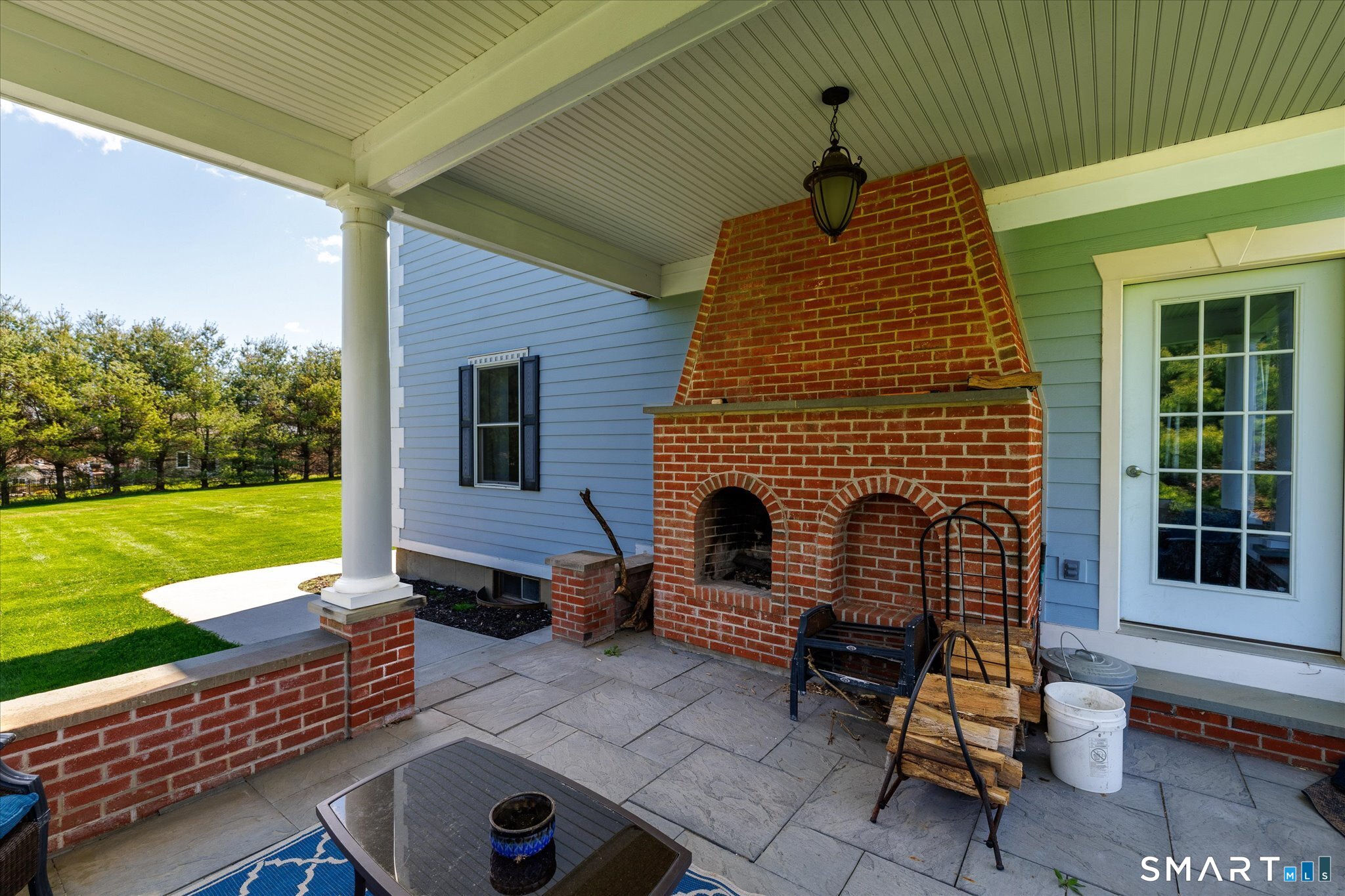 316 Allen Hill Road Brooklyn, CT 06234 - Photo 8 of 40 a backyard of a house with barbeque oven table and chairs