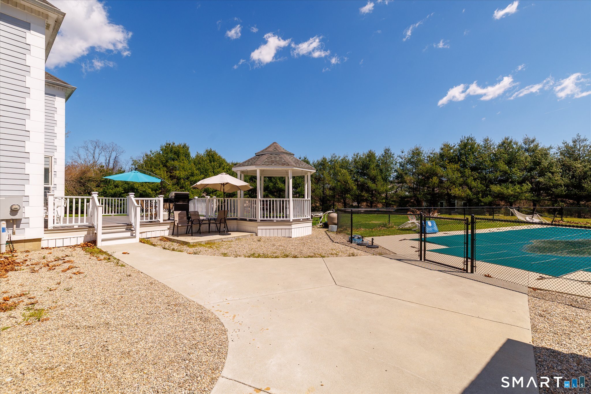 316 Allen Hill Road Brooklyn, CT 06234 - Photo 9 of 40 a view of a swimming pool with a lounge chairs