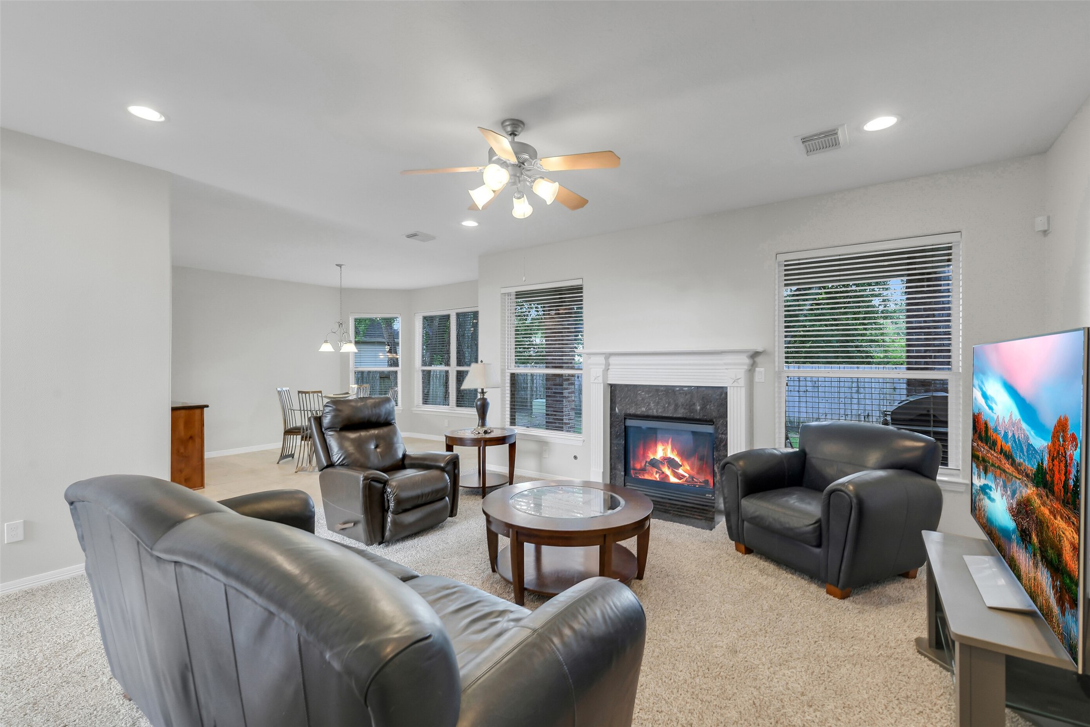 14906 Windsor Manor Houston, TX 77069 - Photo 13 of 34 Large family room with fireplace and mantle over ~
