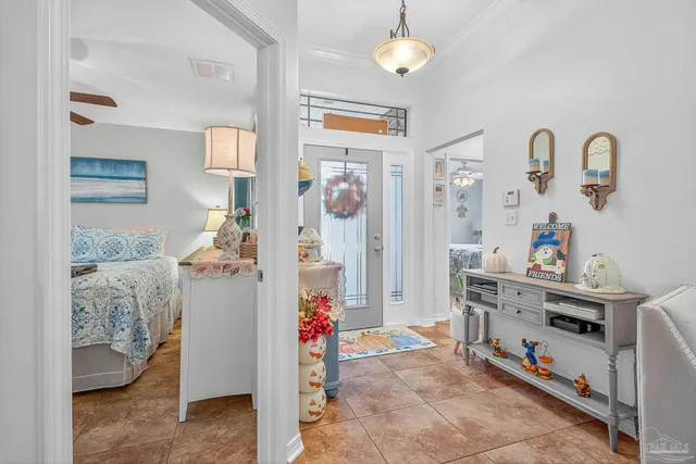 a front view of house with a garden and patio